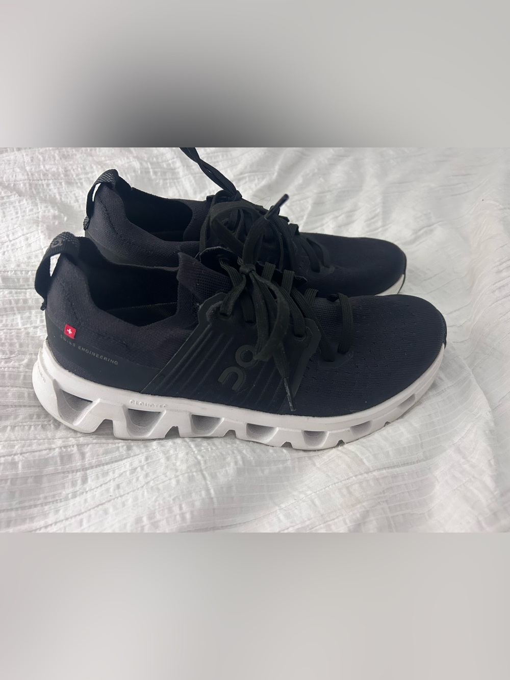 On Running Women’s Black Sneakers with White CloudTec Sole